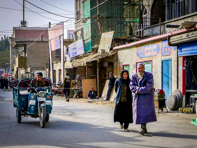 Old Man And Woman Walking In Yarkent, Xinjiang