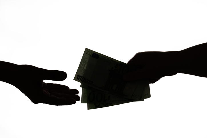 Silhouette Of Business Man Hands Giving Bribe Isolated On White Background. Dark Economy, Corruption Concept