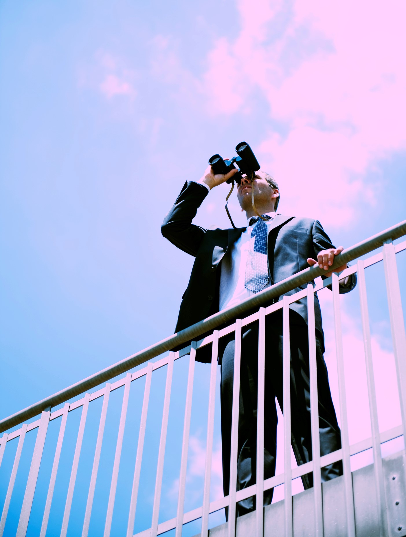 Businessman Looking Through Binoculars