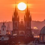 The Sun Sets Up In Between Towers Of The Church Of Our Lady Before Týn In Prague.