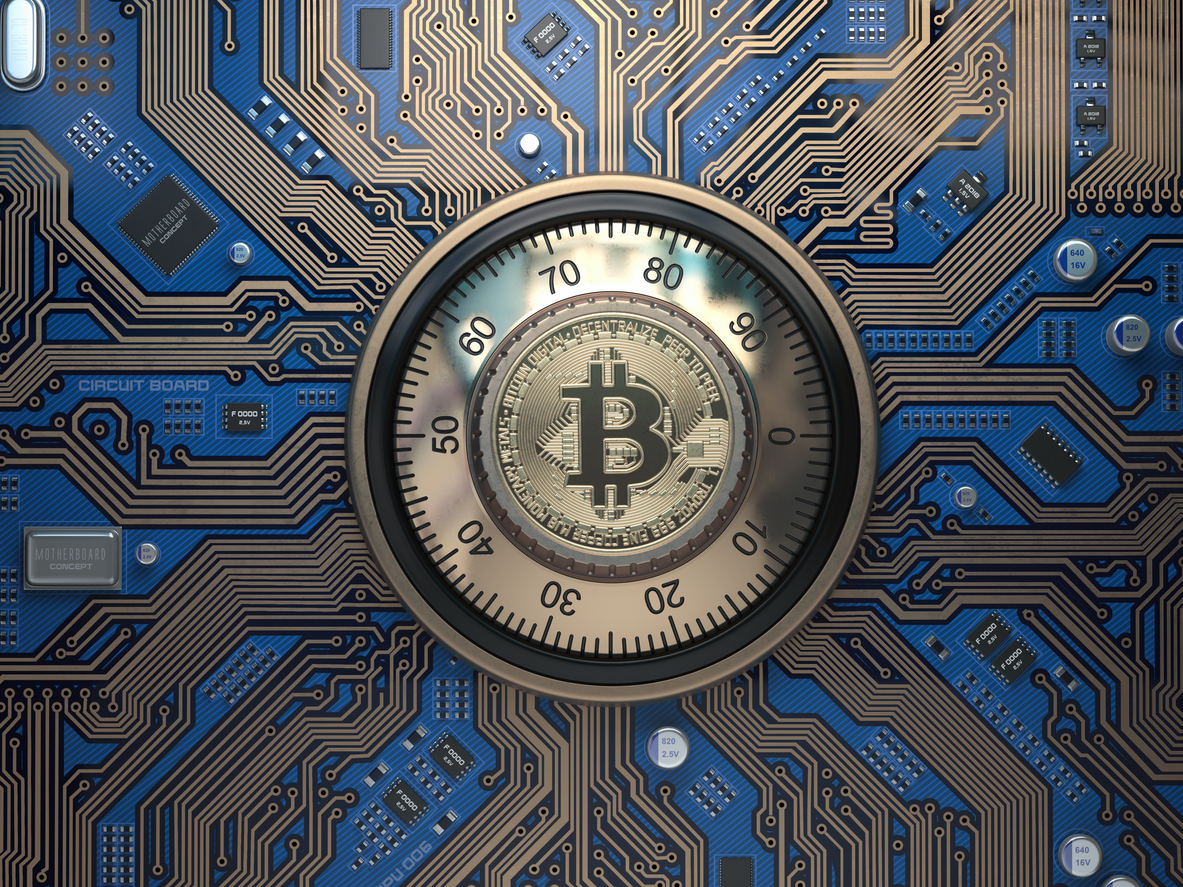 Bitcoin Cryptocurrency Security And Mining Concept. Safe Lock With Symbol Of Bitcoin On Circuit Board.